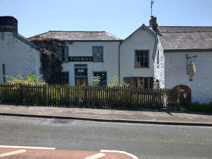 The Thomas Shop Logo